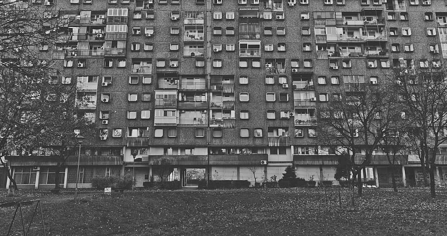 grayscale photo of building, low angle photography of high-rise building HD wallpaper