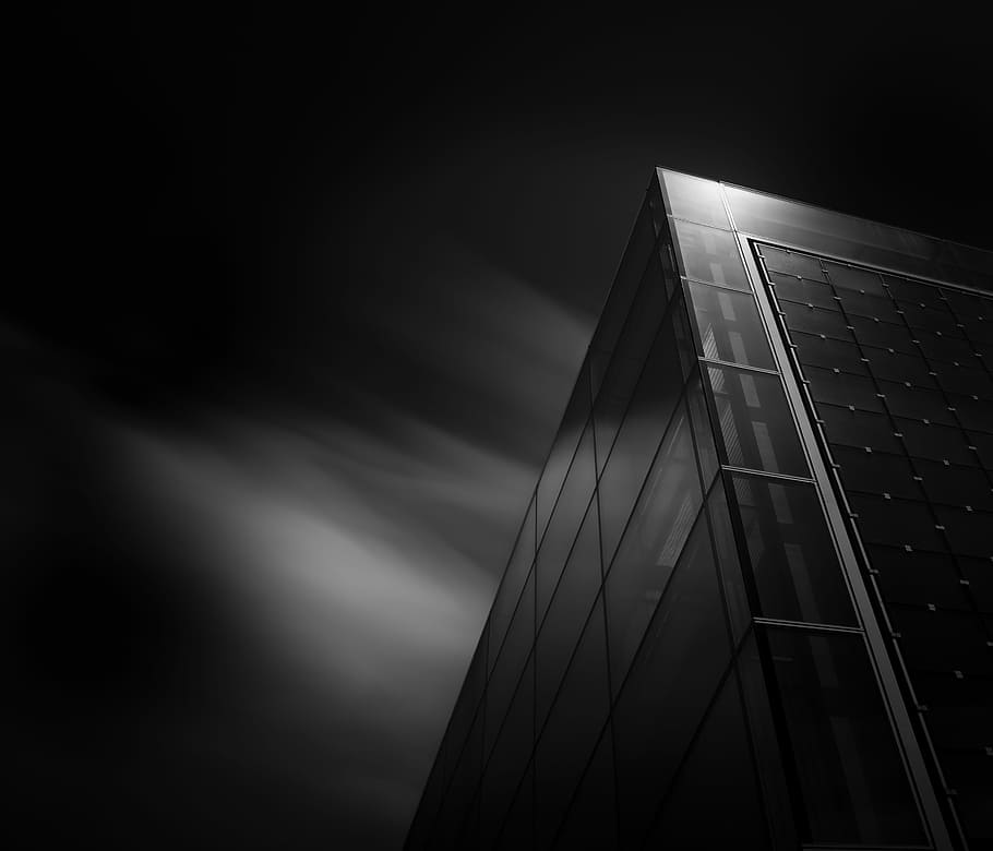 low angle photo of high rise building, black building at night HD wallpaper
