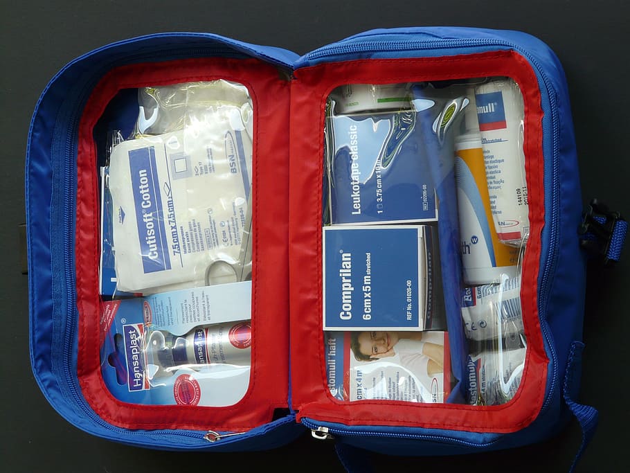 first aid kit in blue pouch, kits medical, patch, red cross box