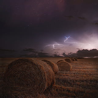 pile of rolled haystack under lightning and clouds, storm, thunderstorm HD wallpaper
