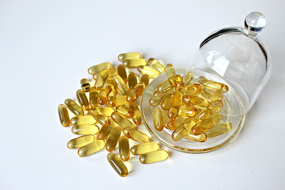 yellow medication tablet lot, fish oil, capsule, oil capsule