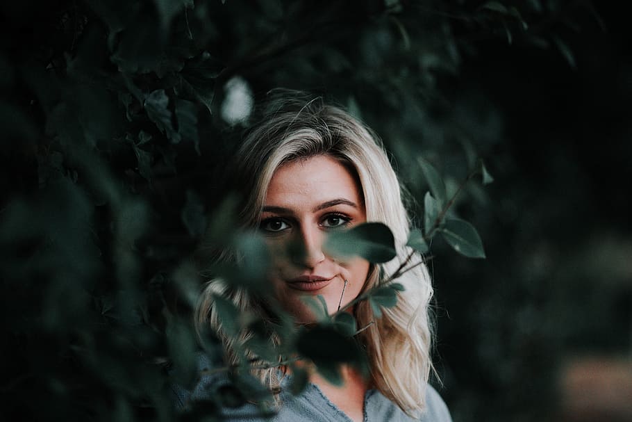 green, leaf, blur, dark, plant, nature, people, woman, portrait HD wallpaper