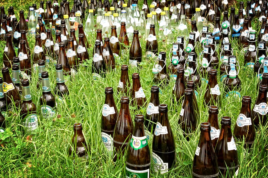 Heineken bottle lot on grass, beer bottles, drink, brown, bottleneck, HD wallpaper