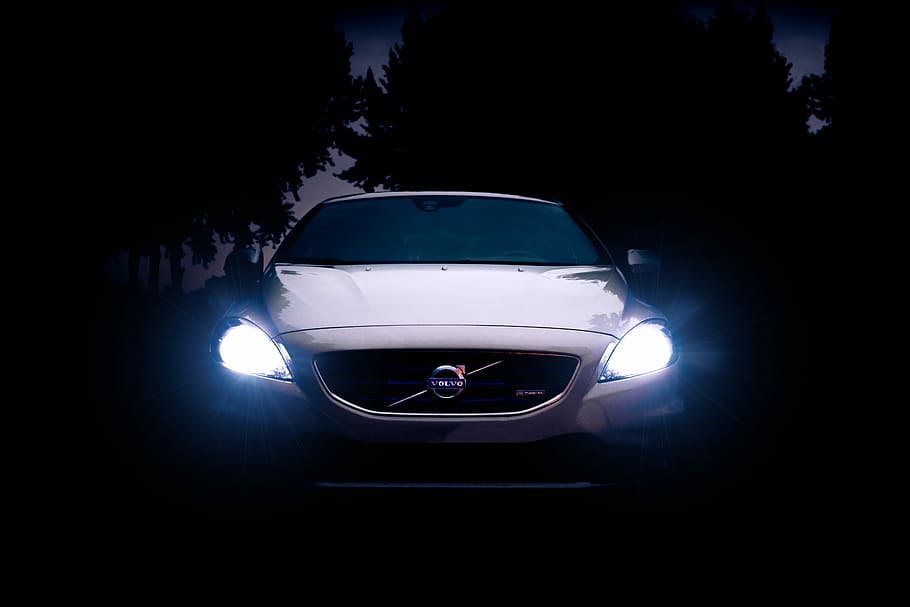 silver Volvo car with headlights on during night, white Volvo car with headlights on HD wallpaper