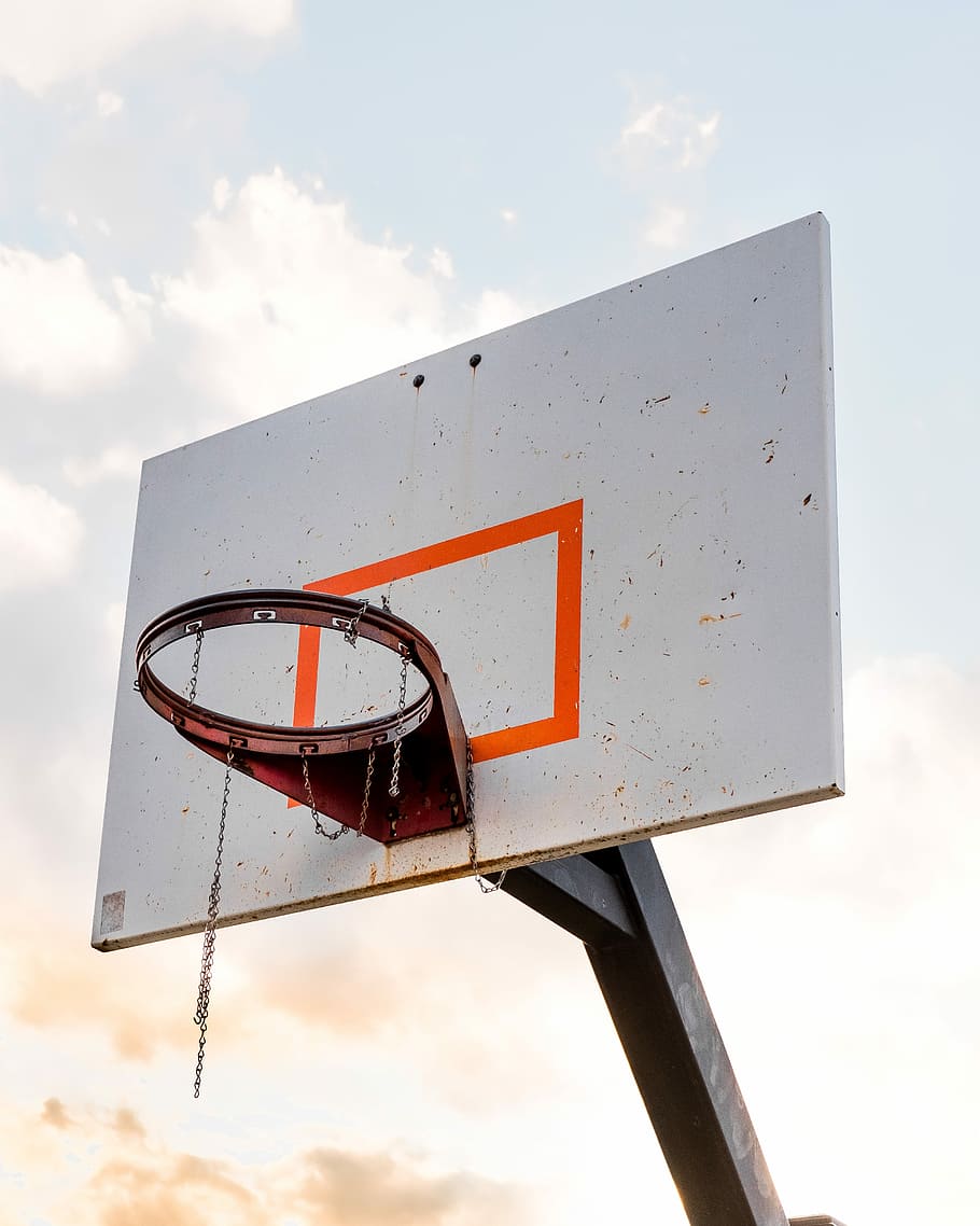 orange steel basketball hoop mounted on white wooden basketball hoop board, orange basketball hoop