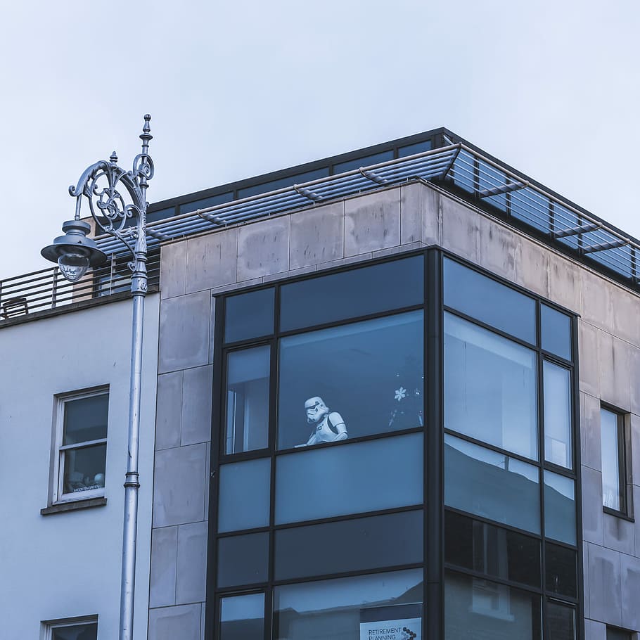 Star Wars Stormtrooper on glass window of building, Stormtrooper inside building looking through window during daytme HD wallpaper