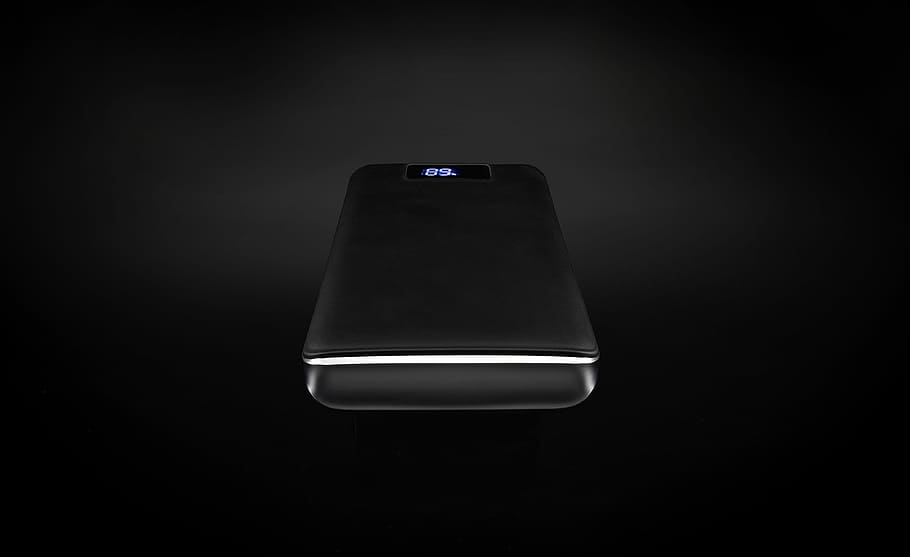 black power bank turned on, black power bank with black background, HD wallpaper
