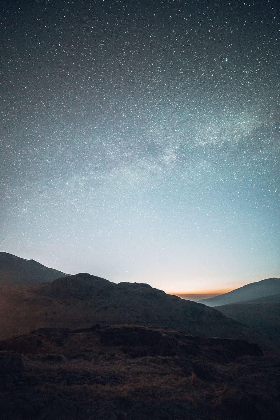 brown rock formation during night photography, black highland s HD wallpaper