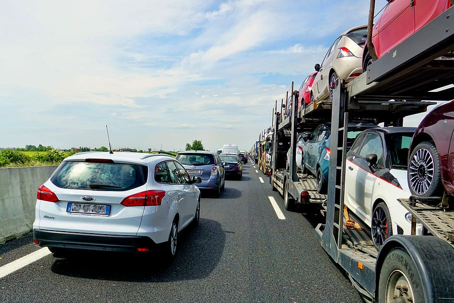 white SUV beside trucl, road, jam, vehicles, highway, traffic HD wallpaper