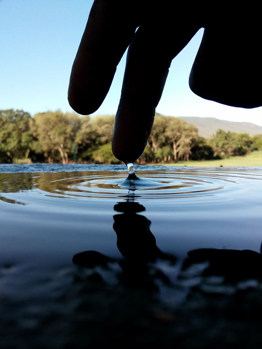 puddle, water, hand, finger, silhouette, ripples, droplet, outdoors HD wallpaper