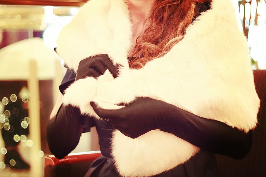 woman wearing black gloves holding white fur scarf inside well lighted room HD wallpaper