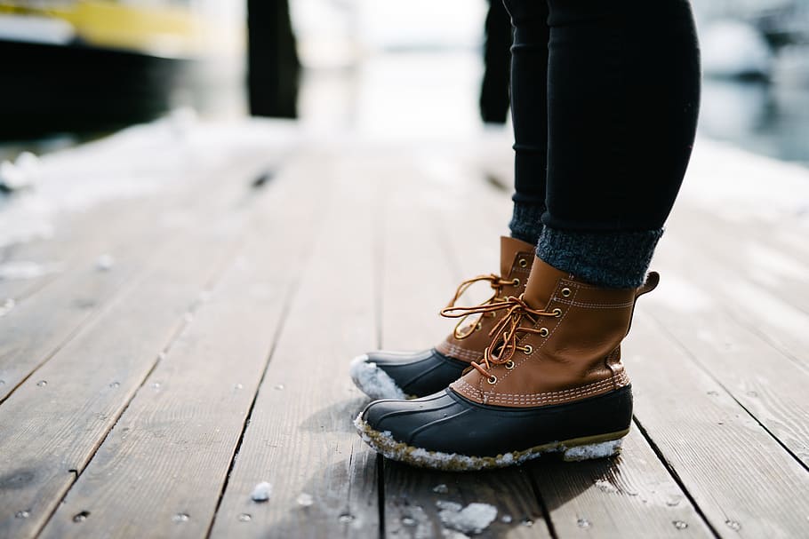 person in bean boots standing on brown wooden floor, snow, winter HD wallpaper