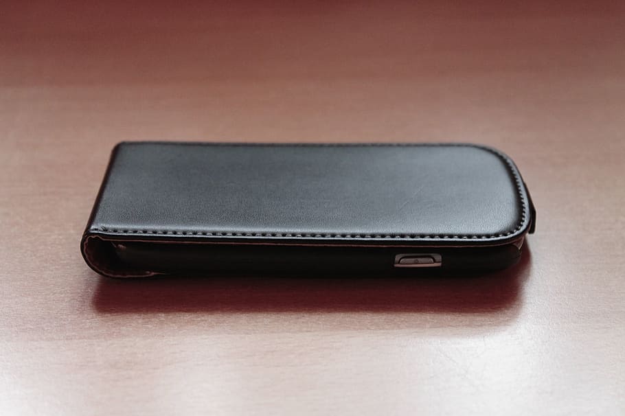 mobile phone, protective case, leather, sleeve, table, technology HD wallpaper