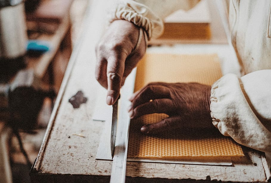person holding chisel while carving wood, person holding knife and cutting paper HD wallpaper