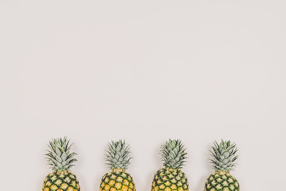 yellow-and-green pineapple fruits near white wall, dessert HD wallpaper
