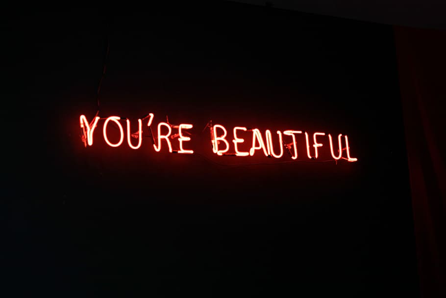 You're Beautiful marquee signage, red and white you're beautiful neon light