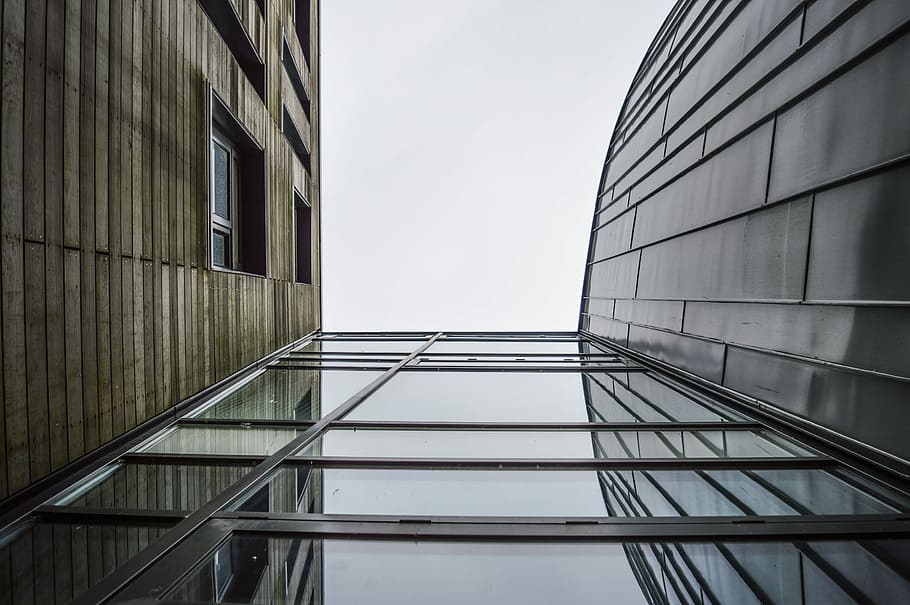 low angle photography of building, worm's-eye view of building during daytime HD wallpaper