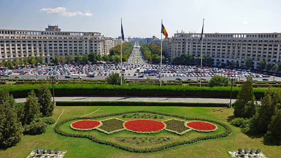 aerial photography of concrete building with three flags, bucharest HD wallpaper