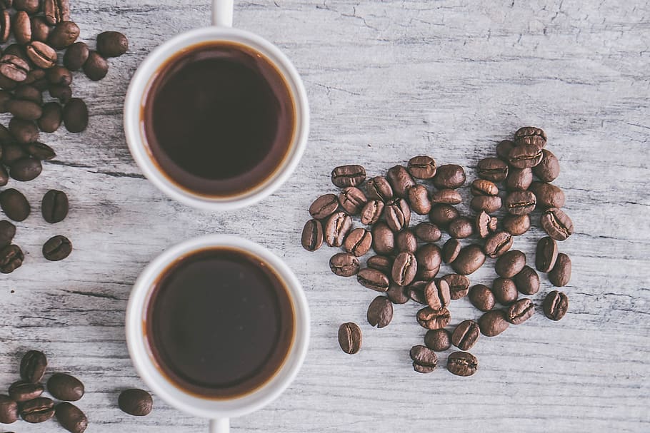 flat lay photo of cup black coffee, two coffee filled cups, beans HD wallpaper