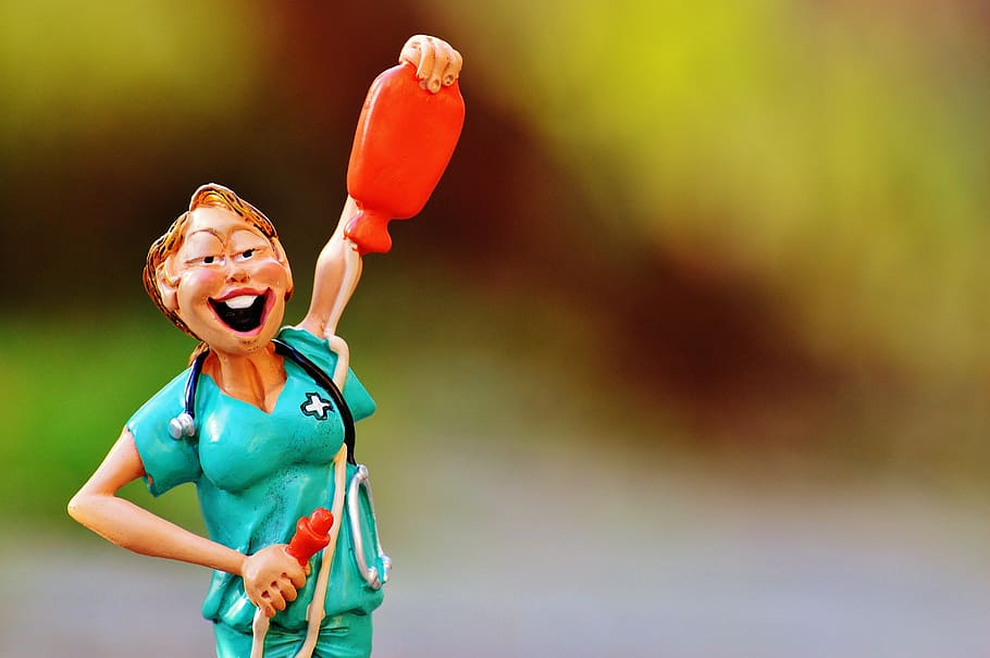 nurse holding red hot water bottle figurine, figure, funny HD wallpaper