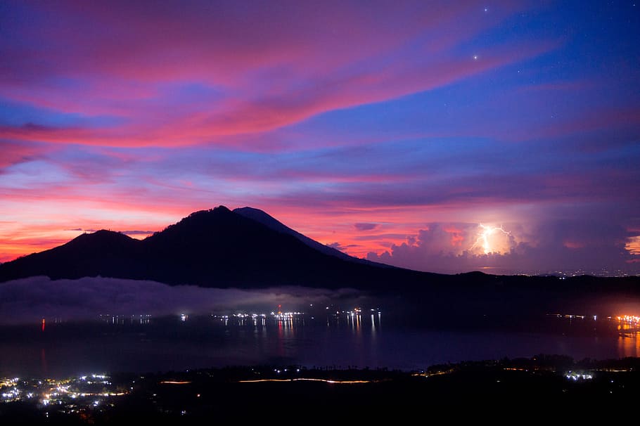 Mountain Beside Body of Water during Sunset, clouds, dawn, fog HD wallpaper