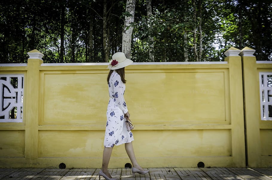 woman walking near yellow concrete wall, girl, summer, nice, young, HD wallpaper