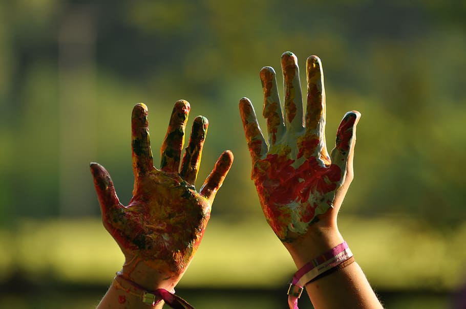 selective focus photography of person's painted hands, colorful HD wallpaper