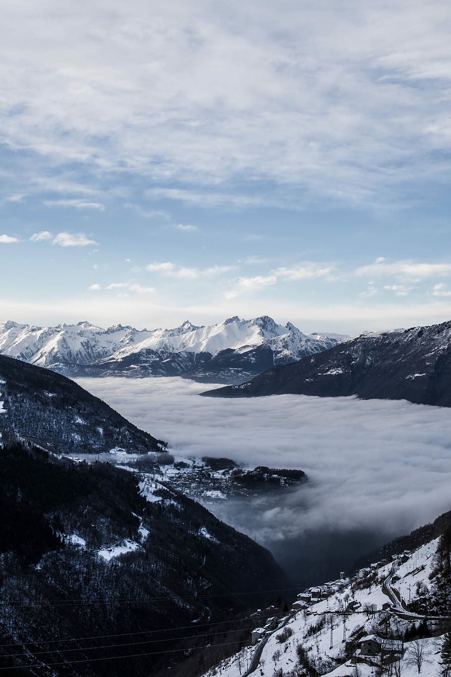 aerial photography of clouds beside mountain, snow-capped mountain HD wallpaper
