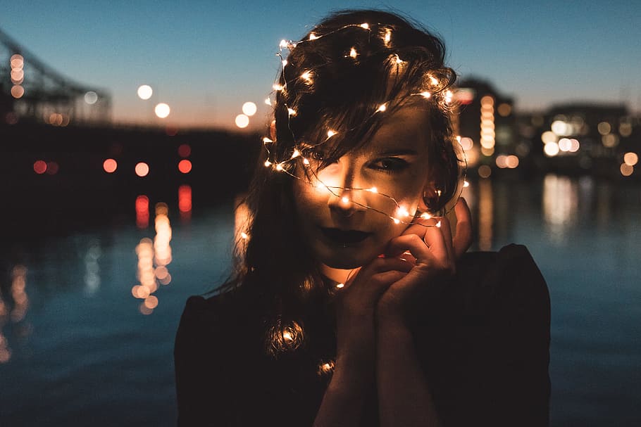 woman holding string lights, Light Veil, night, bokeh, caucasian HD wallpaper