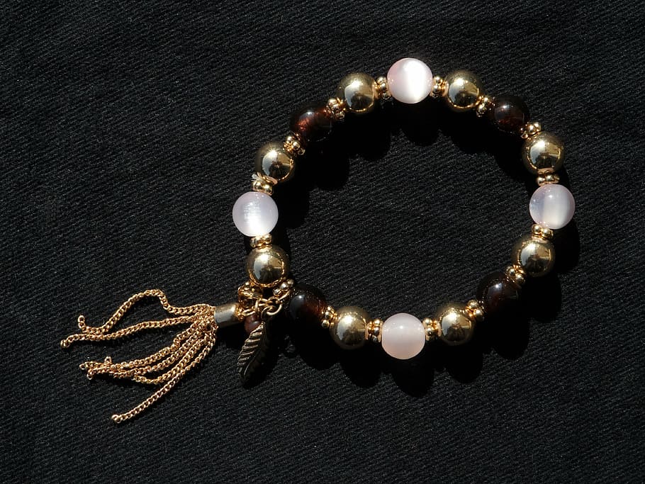 beaded brown and white bracelet on black surface, gold, beads, HD wallpaper