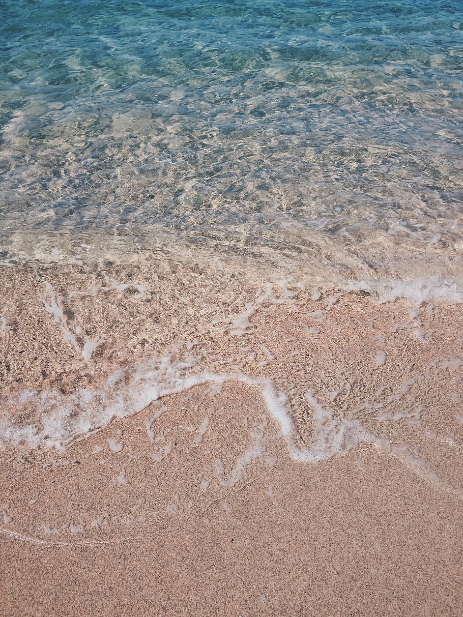 body of water during daytime, body of water on brown sand, beach HD wallpaper