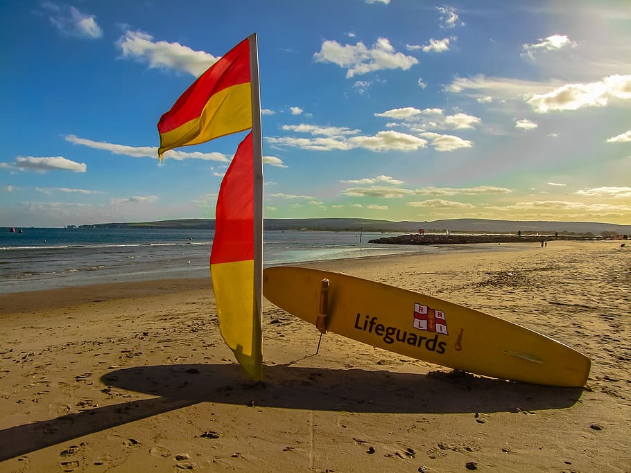 sea, surfboard, sand, beach, water, sky, land, flag, cloud - sky HD wallpaper