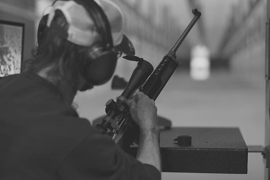 HD wallpaper: grayscaled photo of man holding rifle, shooting range, scope  | Wallpaper Flare