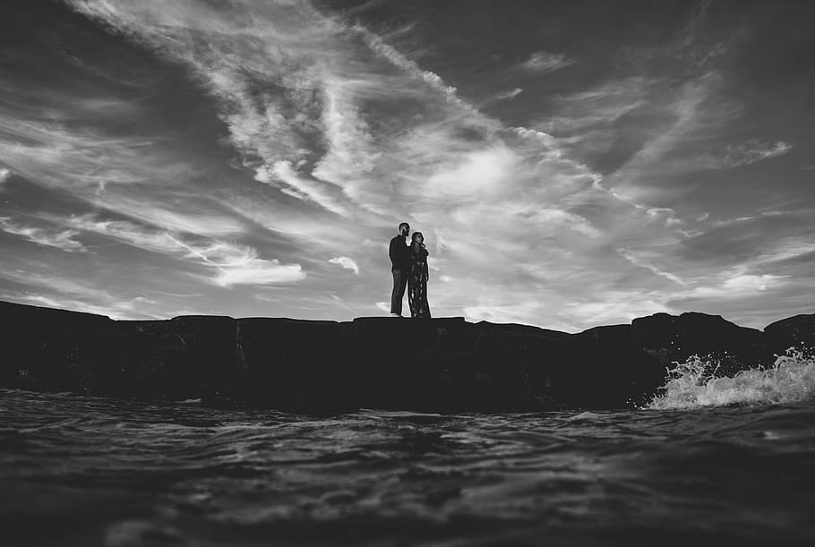 grayscale couple on top of mountain, cloud, sky, rock, water HD wallpaper