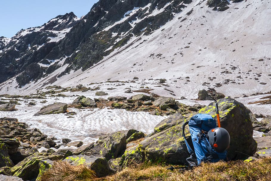 blue hiking backpack near rock, mountaineering, mountains, alpine HD wallpaper