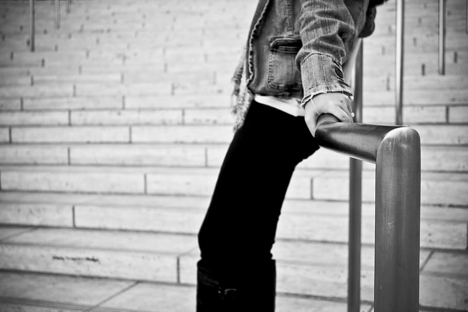 man wearing black pants, male, leaning, steps, stone, concrete HD wallpaper