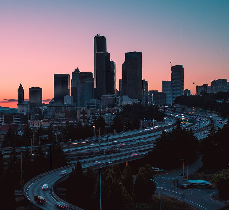 silhouette of highway and buildings, aerial photography of city HD wallpaper