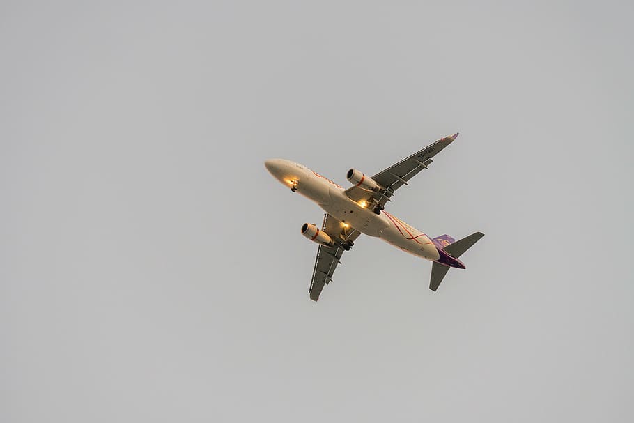 beige and red airplane under gray skies, flying, flight, travel, HD wallpaper