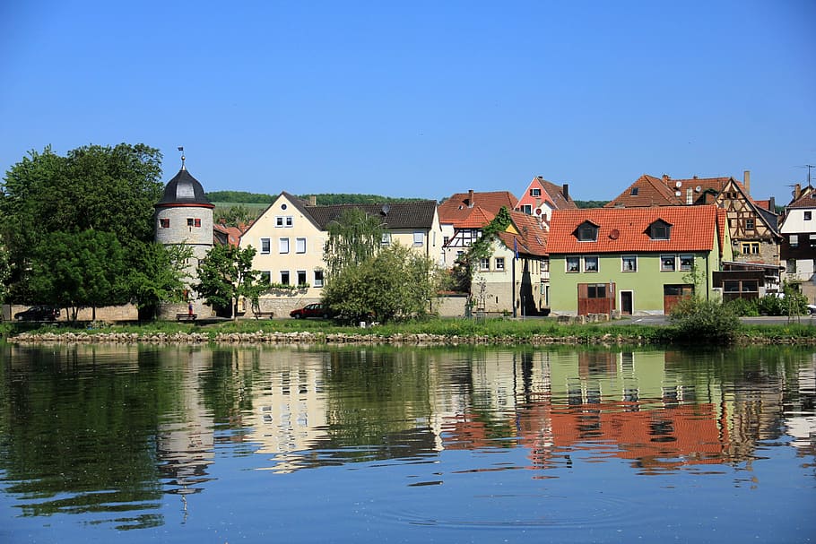 river, water, mirroring, homes, row of houses, cityscape, city view HD wallpaper
