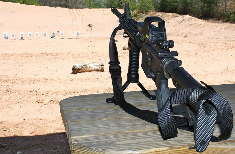 gun, machine, ar, sunlight, weapon, sand, land, nature, no people HD wallpaper