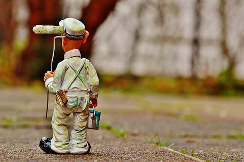 male painter figurine on ground, delete, work, figure, painter working HD wallpaper