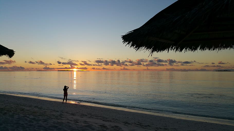 beach, maldives, sea, sunset, silhouette, woman, water, sky HD wallpaper