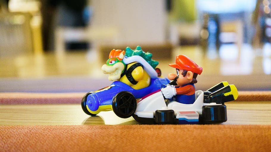selective focus of Super Mario riding on car toy, Car Crash, Toys, HD wallpaper