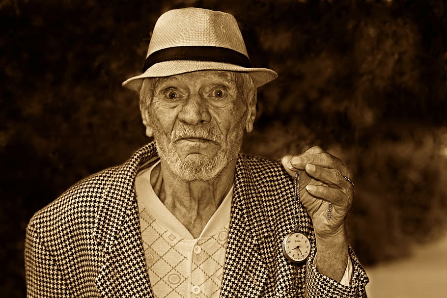 man holding pocket watch, time, old age, fear, sadness, senior adult HD wallpaper