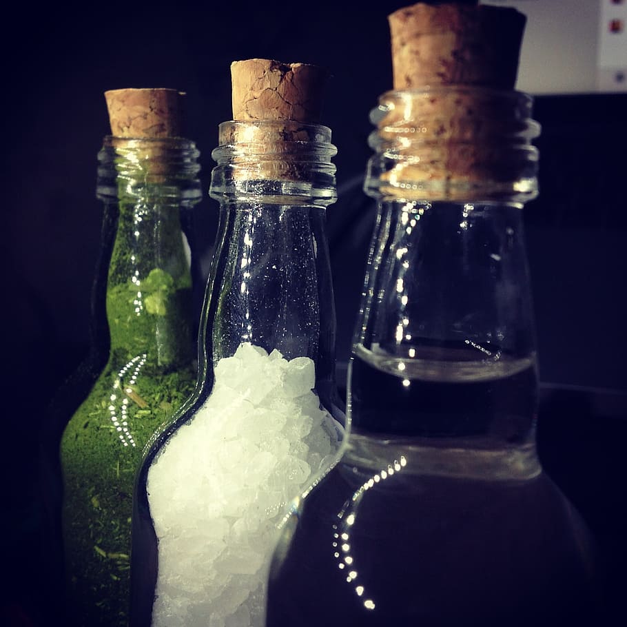close-up photo of three clear glass bottle, herb, salt, water HD wallpaper