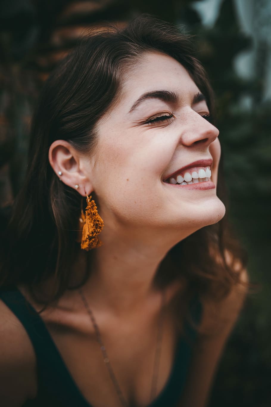 Just plan happy, woman wearing brown tassel drop earrings, one person HD wallpaper