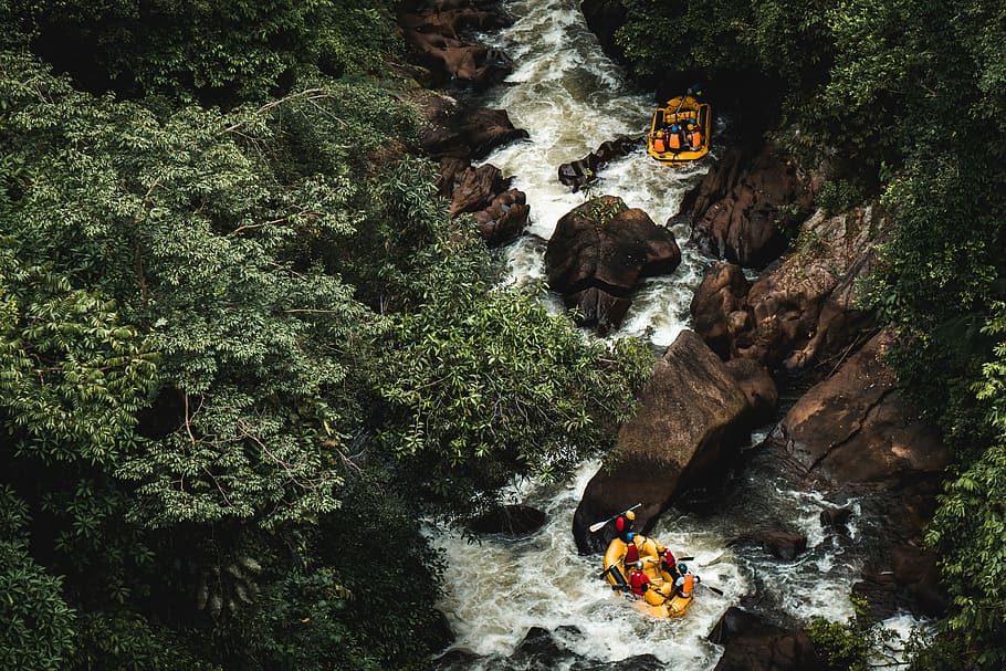 people rafting in the river, group of people on yellow inflatable boats rowing between rock formation HD wallpaper