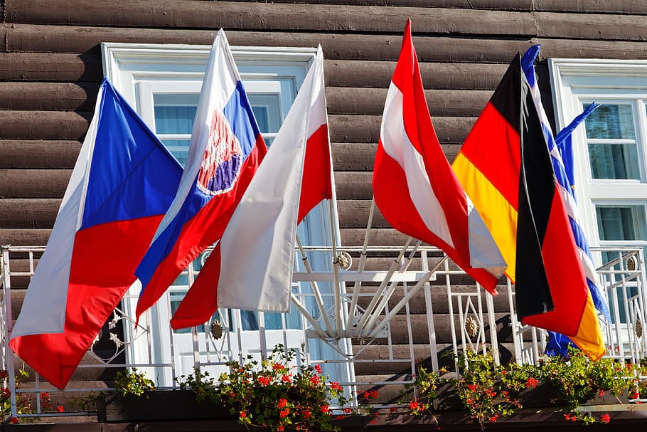 assorted flags hanging on the fence, Austrian, Colorful, Country