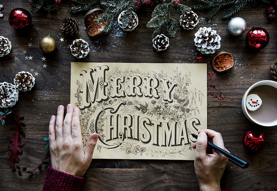 person writing Merry Christmas on white paper, background, card, HD wallpaper