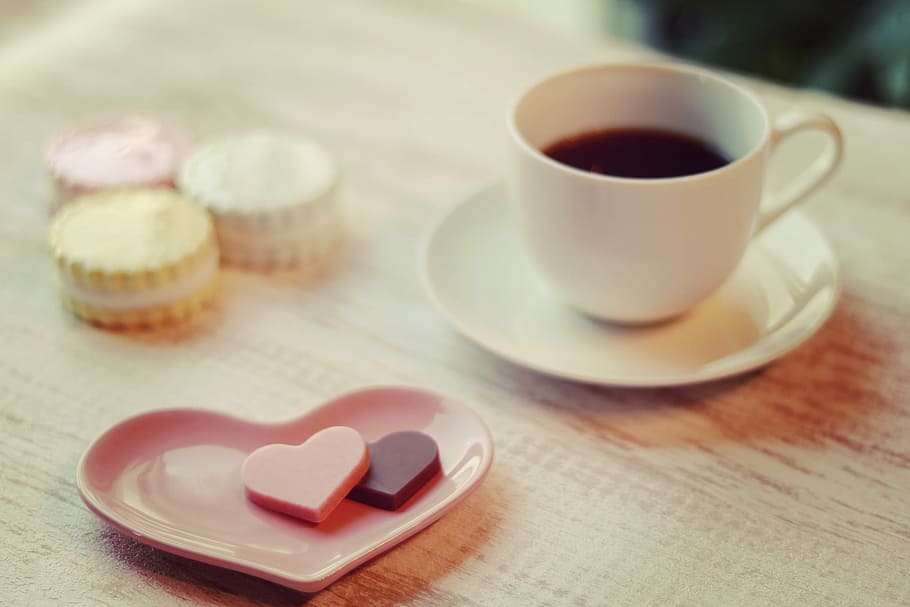 white ceramic teacup with plate on table with macaroons and heart-shaped plate HD wallpaper